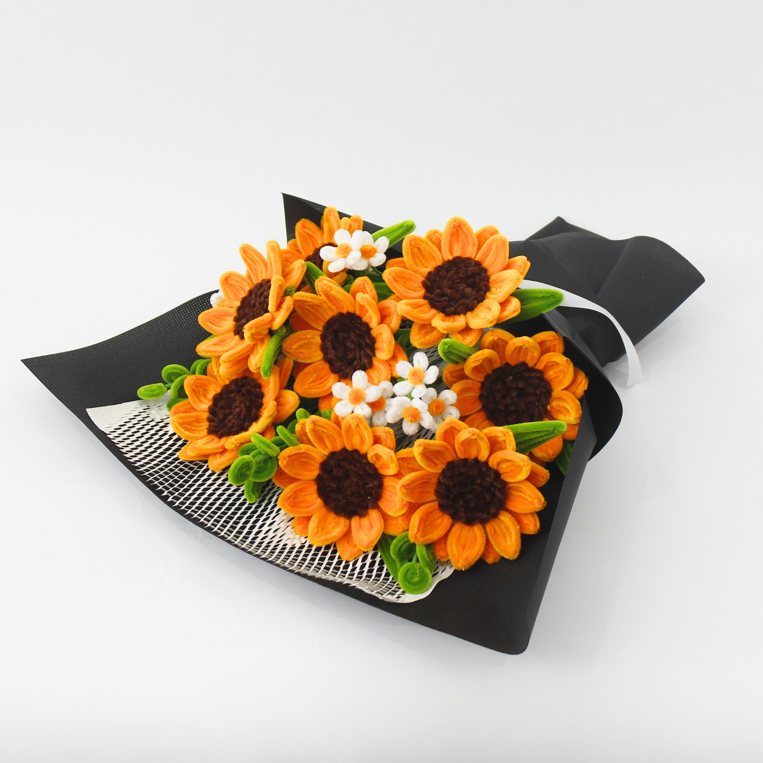 Handcrafted orange sunflower bouquet made from fuzzy pipe cleaners, styled with delicate white blooms. A perfect handmade gift or aesthetic decor piece for flower lovers.

