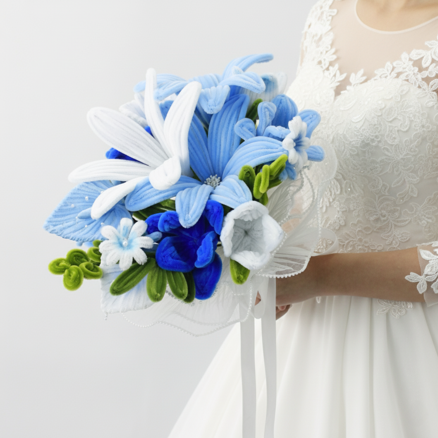 Bride holding a handmade everlasting wedding bouquet in blue and white tones, crafted from pipe cleaners, unique bridal flower arrangement in Australia.