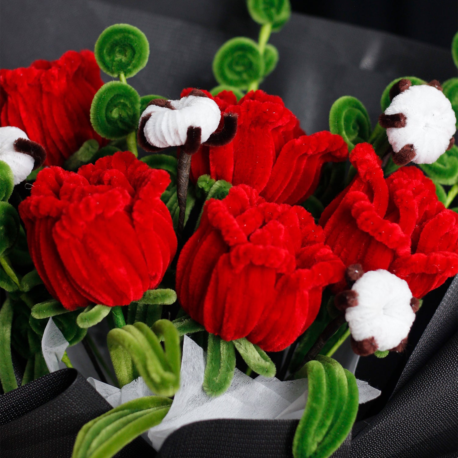 Elegant white and blue pipe cleaner flower bouquet with velvet texture, wrapped in white and icy blue paper. A handmade winter gift perfect for Christmas and seasonal decoration.