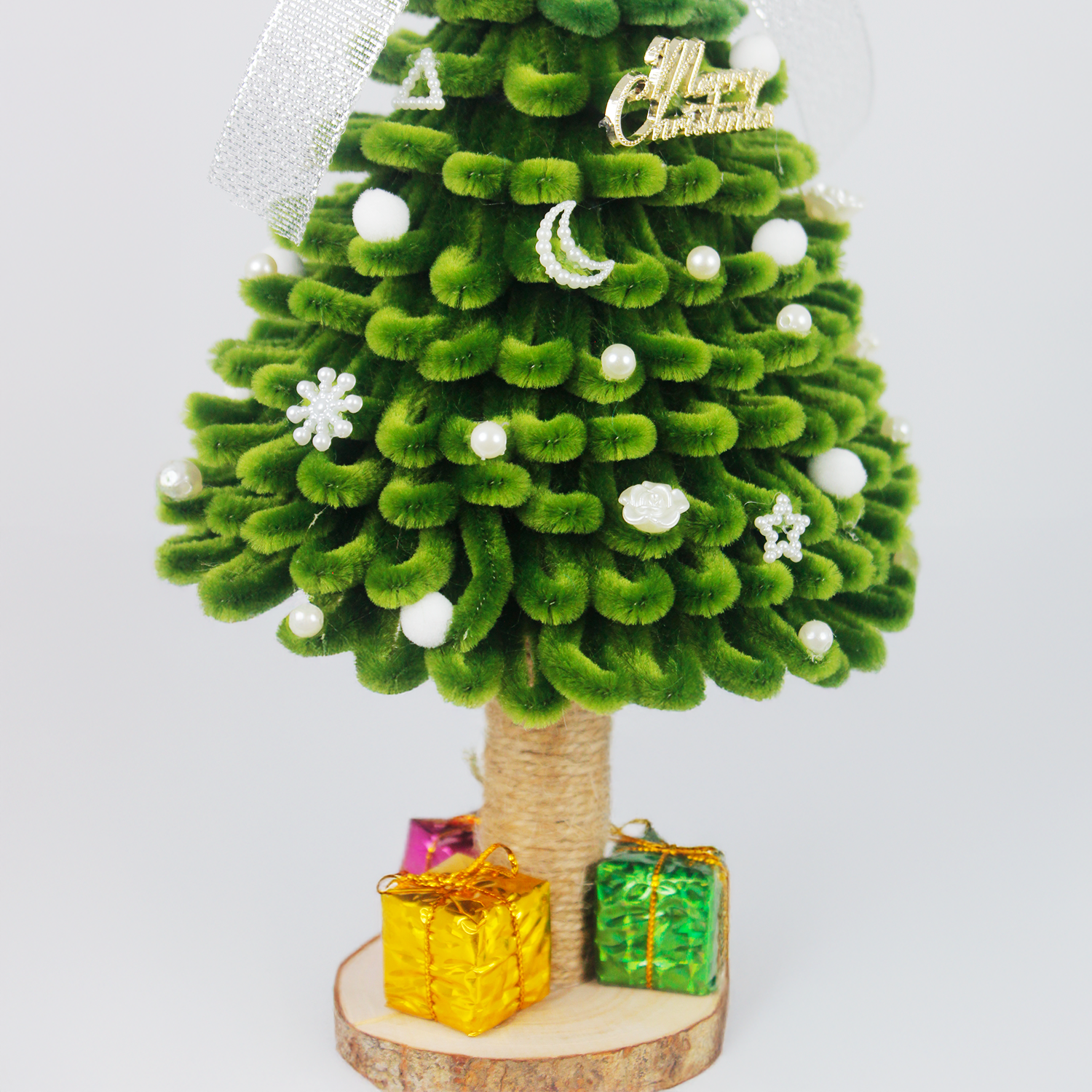 Classic green DIY Christmas tree made of fuzzy wire with silver bow and gift boxes – handmade holiday gift for friends or festive home decoration.