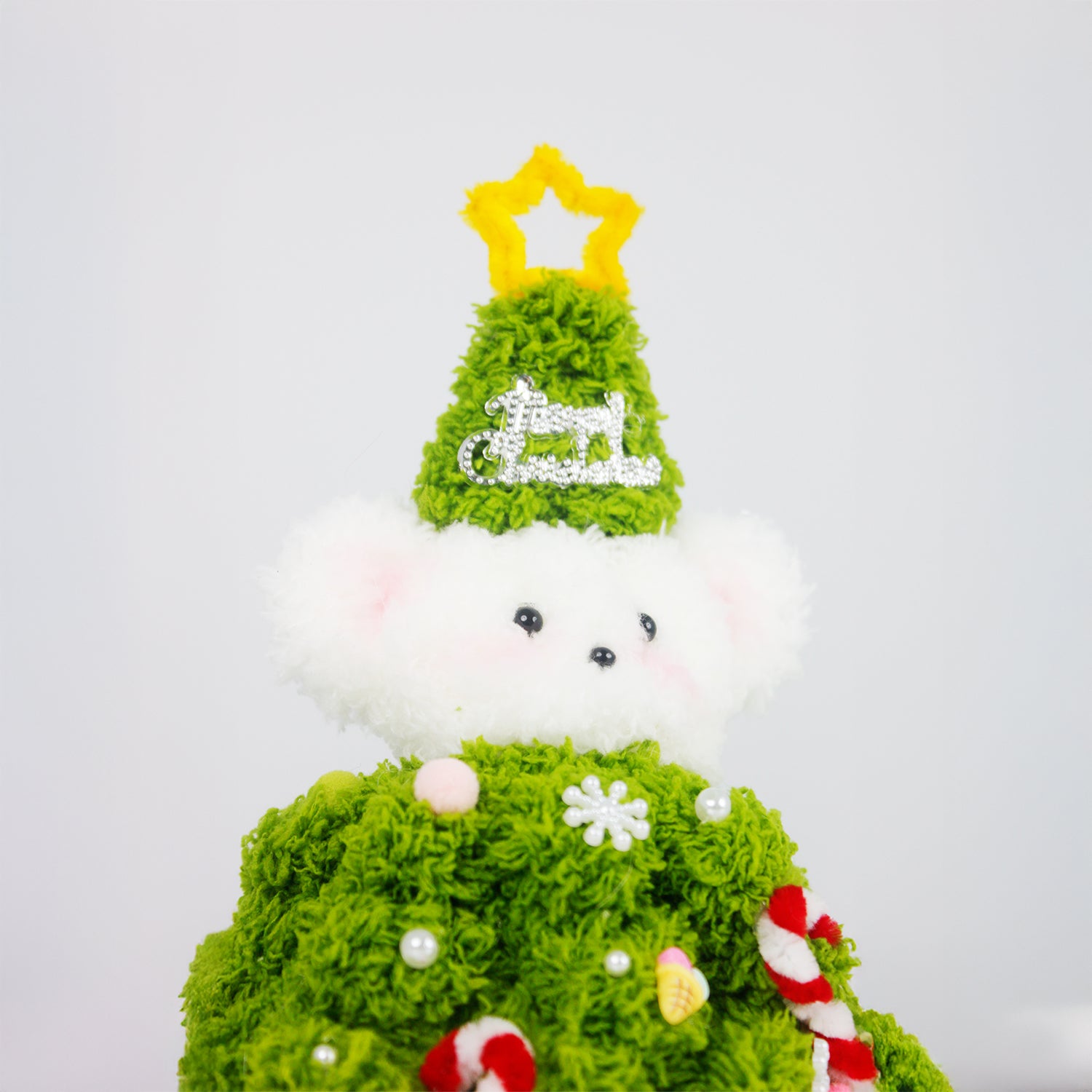 Adorable Christmas tree bear made from green pipe cleaners, decorated with candy canes and snowflakes. A perfect handmade Christmas gift or festive home decoration.